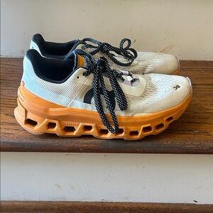 On Running Cloudstratus with Orange and Black